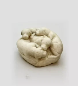 Roman marble sculpture of four snuggled up puppies, 1st century BC, from the House of Faun in Pompeii.